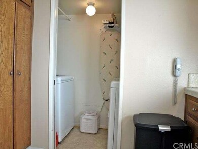Laundry area conveniently located adjacent to kitc