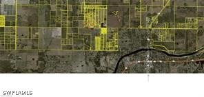 Aerial view of property's location with property b