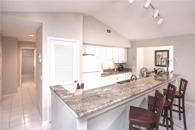 1195 Winding Oaks Cir E unit 307, Vero Beach, FL 32963 - photo 7