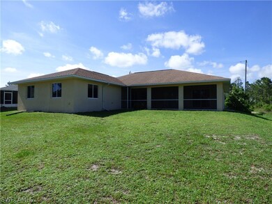 1243 Eclair St E, Lehigh Acres, FL 33974 - photo 3