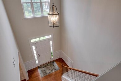 Notice that there are no steps to enter the house, and you will be welcomed by a beautiful two-story foyer.
