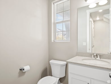 Bathroom with toilet and vanity