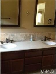 Master ensuite bath with double vanities, shower &