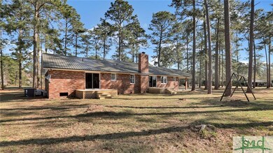 Rear view of the property.  2 decks leading out fr