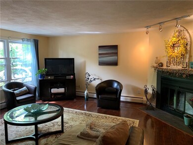 Gleaming floors in this spacious living room open