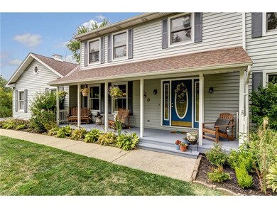 Inviting Front porch...Beautiful landscaping