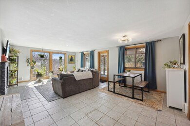 Living room opens to the three season porch.