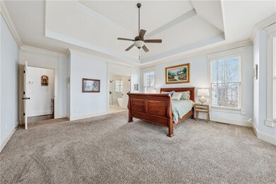 Bedroom with tray ceiling and Golf Course Views.