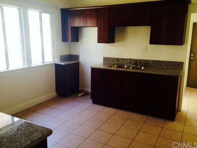 Downstairs Kitchen featuring granite counters and 