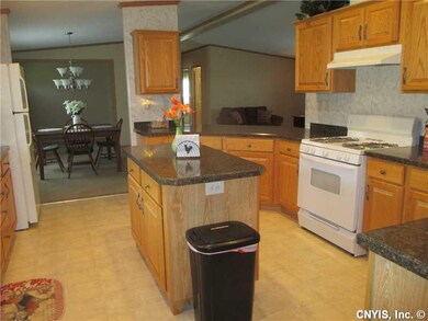Kitchen. The Oak Kitchen is open and inviting offe