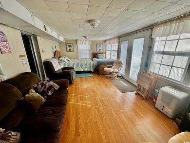 Bedroom featuring french doors, access to outside,