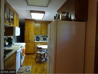 The kitchen has updated appliances and lots of cup