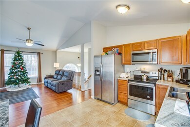 Kitchen/dining room combination with vinyl floors.