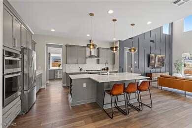 Executive island in this grand kitchen! Full built