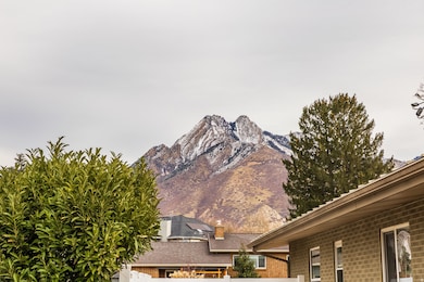 5088 S Woodmont Dr, Salt Lake City, UT 84117 - photo 2