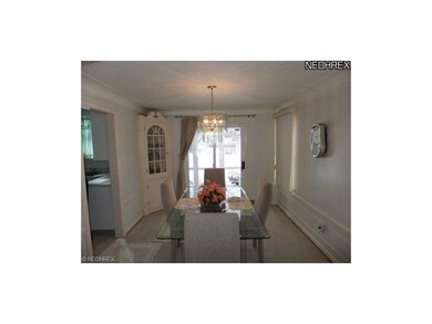 DINING ROOM WITH BUILT-INS AND SLIDING DOORS OUT T