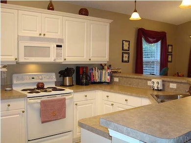 Large, bright and open kitchen. No more missing out on the fun while you're in the kitchen!