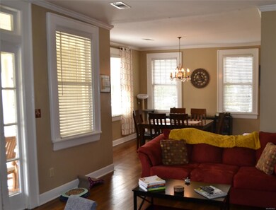 Looking from the living room into the formal dinin