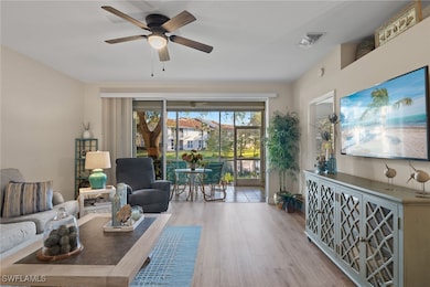Living room featuring light hardwood / wood-style