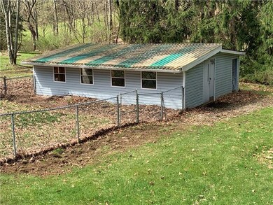 Fence has been removed Shed on the back portion of
