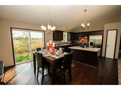 Beautiful Flooring Throughout Dining and Kitchen A