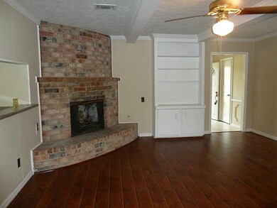 Another view of family room with bookshelf