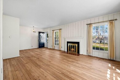 Living room with wood burning fireplace