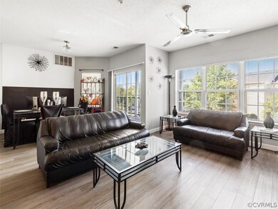 The family room is open to the kitchen and feature