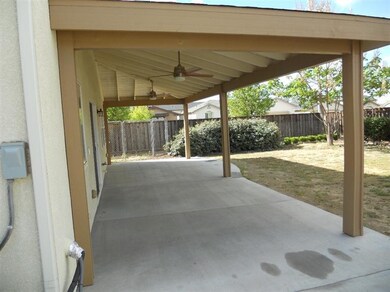 Back patio, with fans,and power.  Fully permitted 