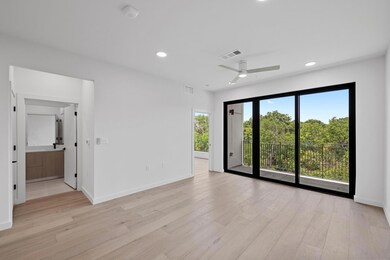 Spare room with ceiling fan, light wood-style flo