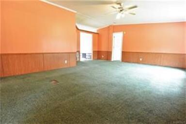 THE LIVING ROOM IS LARGE.