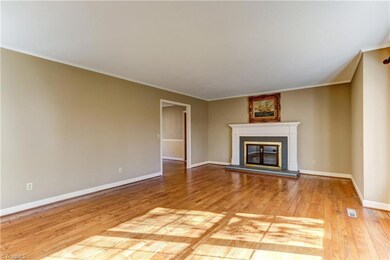 SPACIOUS FORMAL LIVING ROOM WITH GAS LOG FIREPLACE
