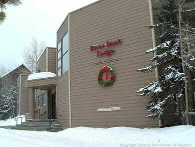 Exterior Front. Front Door to River Bank Lodge.