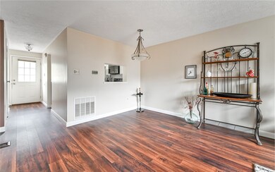 View from Living Room through to entry and front d