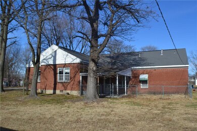Back of the house, notice the covered patio and th