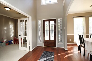 Study or office on left with French doors.  The formal dining is on the right hand side.
