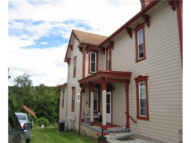 Exterior Front. Left side view of home showing one