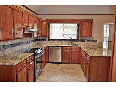 Kitchen. Kitchen Cabinets have been refinished. Ne