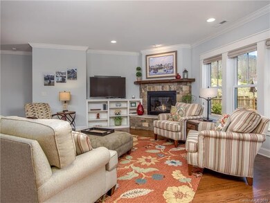 The warmth of the gas log fireplace with the stone