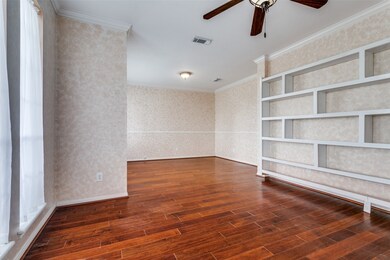 The front office/library shines with these stylish built ins.