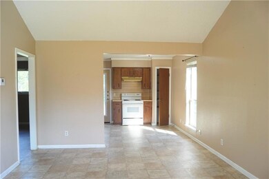 Unfurnished living room with plenty of natural li