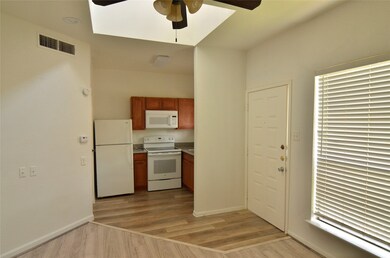 looking toward front door & kitchen