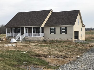 Love this front porch on this 2.5 acre home