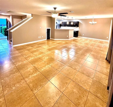 Unfurnished living room with a textured ceiling, 