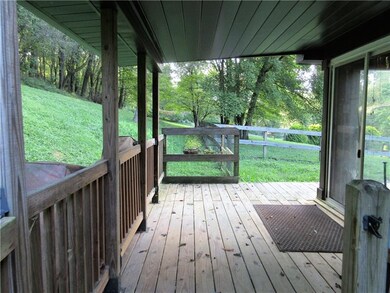 The glass siding doors in the four season room lea