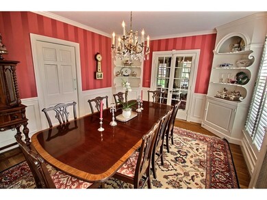 Formal dining room with detailed built-ins