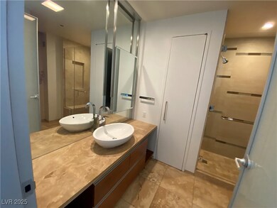 Full bathroom with a stall shower and vanity