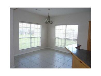 Dining Room. Your casual dining experience includes views of the back yard and plenty of natural lighting.