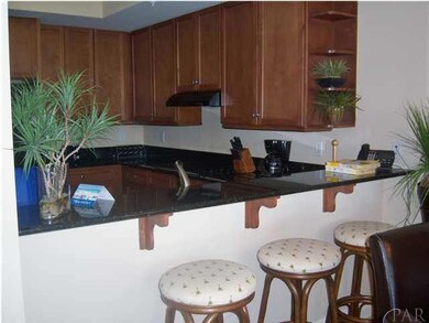 The dining room table has plenty of room for family or friends.