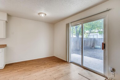 Spare room featuring a textured ceiling and light
